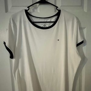 Gently used -only worn once Tommy Hilfiger tshirt. White with navy blue accents.